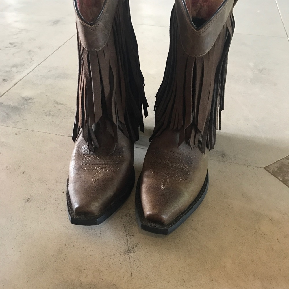 Ariat gold rush fringe boots.